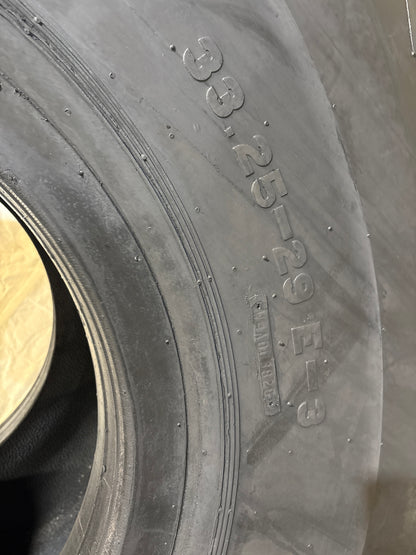33.25-29 FIRESTONE SUPER ROCK GRIP WB #5921