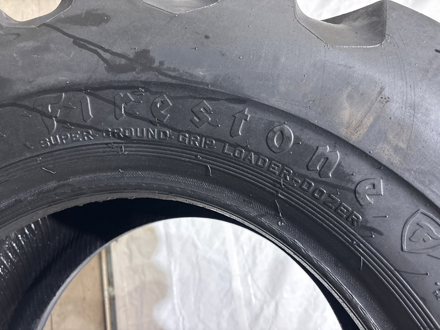 17.5-25 FIRESTONE SUPER GROUND GRIP LD L-2 12 PLY LOADER/DOZER TIRE #5751